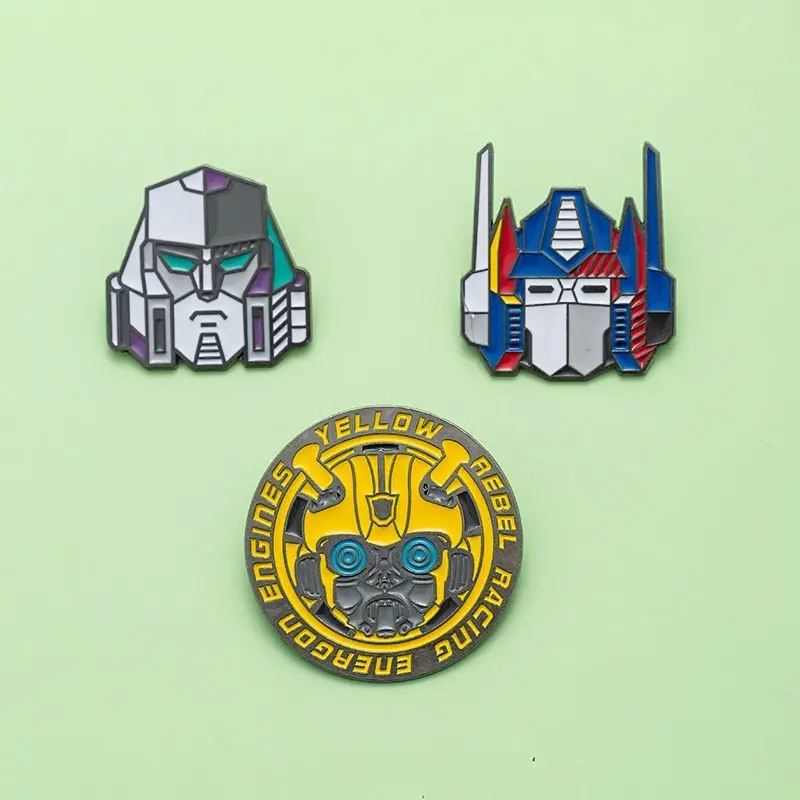 3 ชิ้น/เซ็ต Transformation เข็มกลัด Bumblebee อุปกรณ์ต่อพ่วงป้ายโลหะอะนิเมะการ์ตูน Badge นักเรียนกระเป๋าเป้สะพายหลังอุปกรณ์ตกแต่งของขวัญ