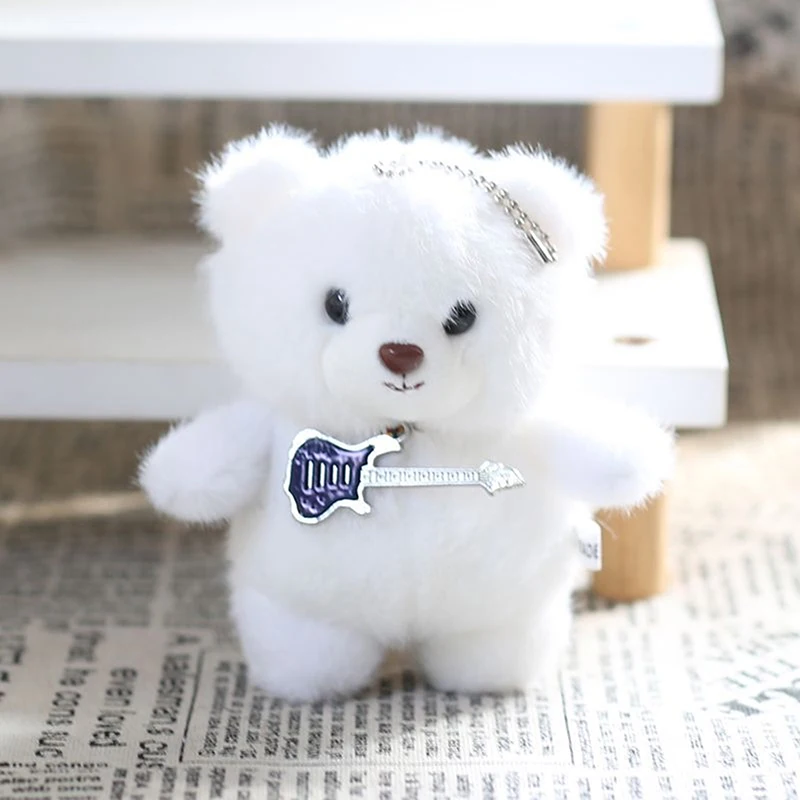 Poupée en peluche avec pendentif ours en peluche de guitare douce - Porte-clés en peluche mignon pour sac à dos - Cadeau d'anniversaire idéal pour enfant.
