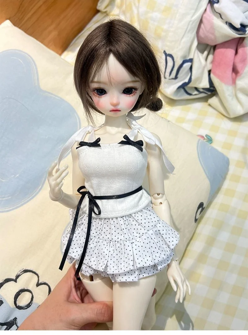 

bjd doll clothes are suitable for 1/4 1/6 1/5 and 1/12 size white bow halter tops and skirt doll accessories