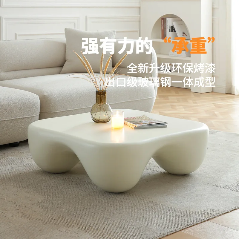 

Modern minimalist cream wind fiberglass coffee table special-shaped designer small apartment living room household