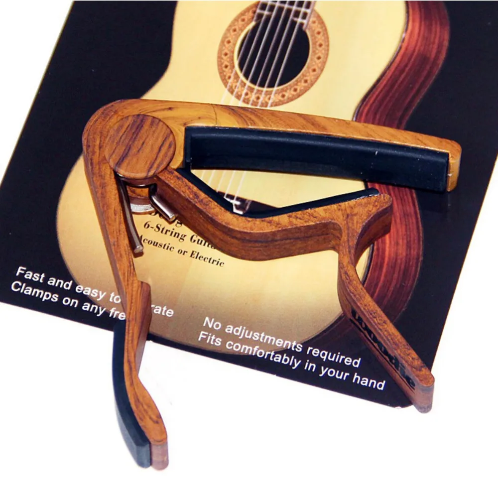 

Guitar Capo Acoustic Electric Precise Design Stable Performance Easy Use Rubber Padded Strings Tight Repositioned Musical