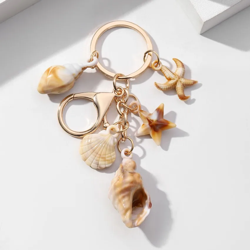 

New Creative Personalized Seaside Vacation Shell Keychain Acrylic Conch Five Pointed Star Keychain Pendant Gift Wholesale