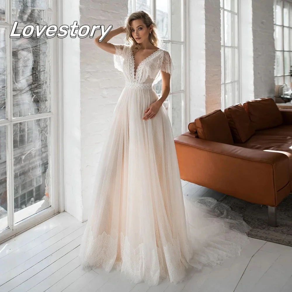 

Cap Sleeve Boho A-Line Wedding Dresses Lace Applique Bride Robe V-Neck Backless Bridal Gown Champagne Dot Tulle Vestido De Noiva