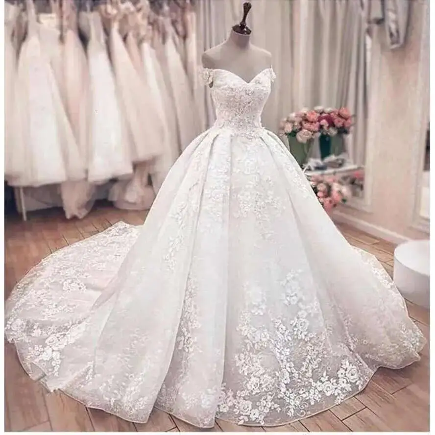

Arabic Dubai Ball Gown Dresses Off The Shoulder Beads Appliques Wedding Dress Bridal Gowns With Lace Up Back Cph S