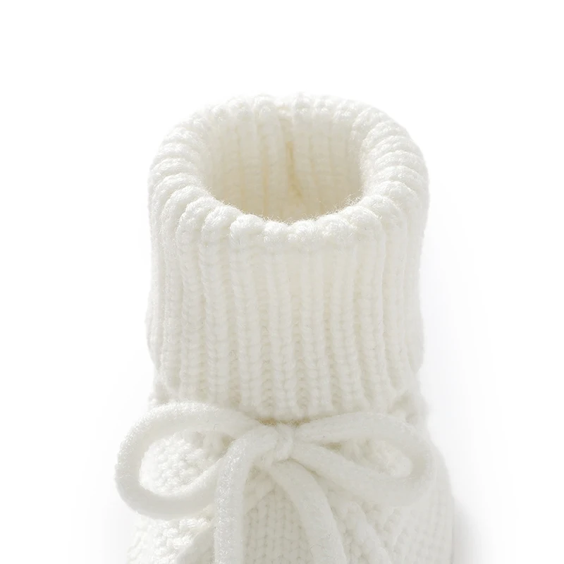 أحذية مشوا لأول مرة للفتيات الصغيرات من عمر 0 إلى 18 شهرًا نعل ناعم متماسك لحديثي الولادة بعقدة على شكل فيونكة لمرحلة ما قبل المشي أحذية كروشيه للأطفال الصغار غير قابلة للانزلاق