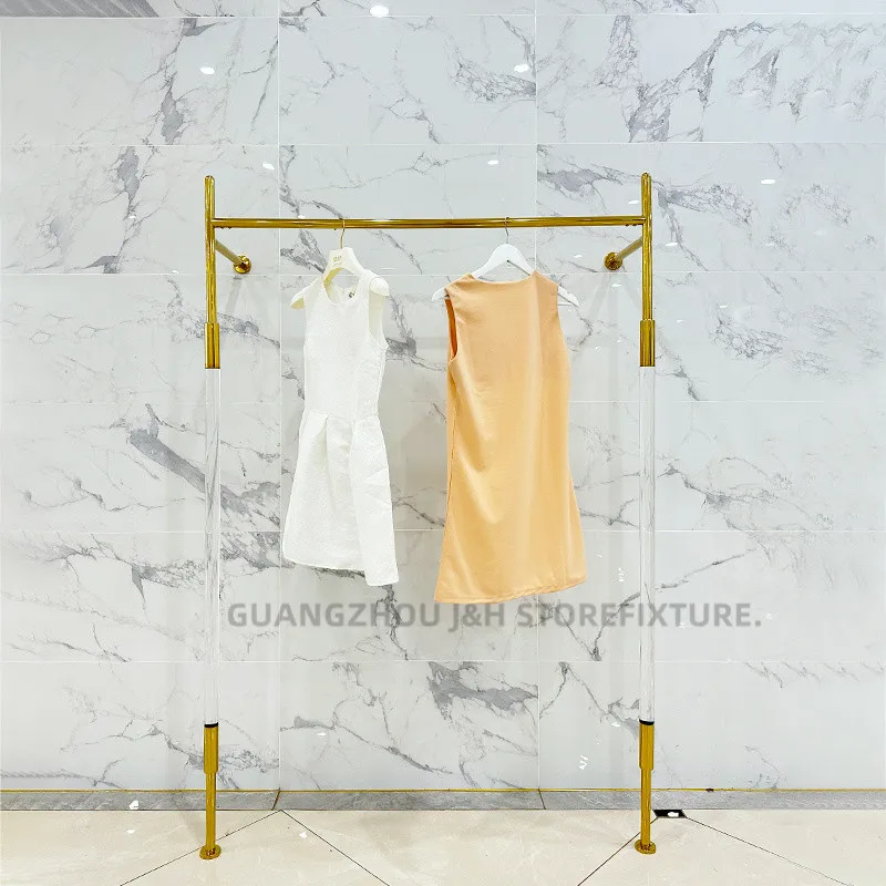متجر ملابس النساء حامل ملابس أكريليك من الفولاذ المقاوم للصدأ تصميم مخصص رف عرض الملابس المثبت على الحائط