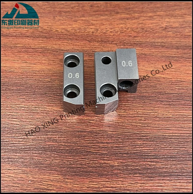 

High Quality Nail Head for Muller Martini Printing Machinery Spare Parts Stitching Head Nail Head 75