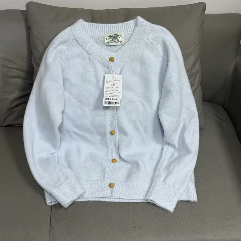 Nowy kardigan 2025 podkreśla Twoją osobowość, słodki styl. Luźny krój, mieszanka wełny, modny materiał.