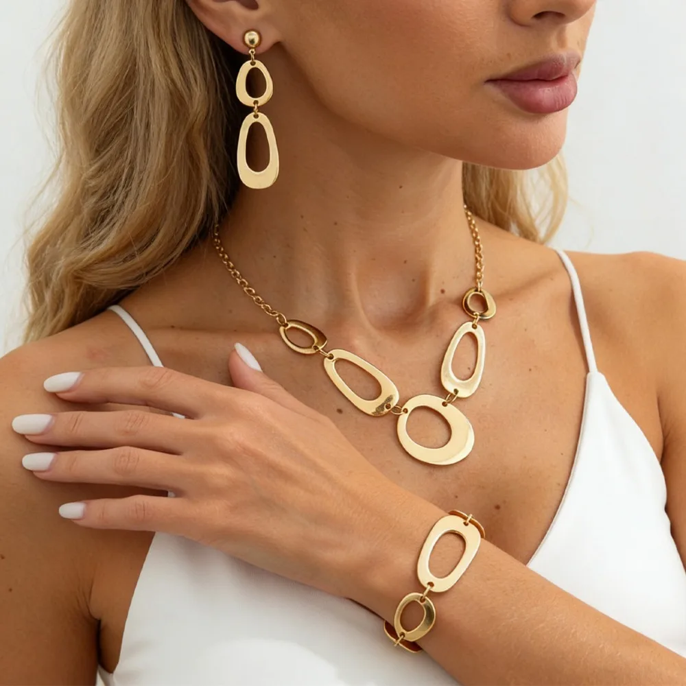 Nouvel ensemble créatif de bijoux pour femme : collier ras du cou, bracelets et boucles d'oreilles en métal irrégulier ajouré en forme de O, idéal comme cadeau