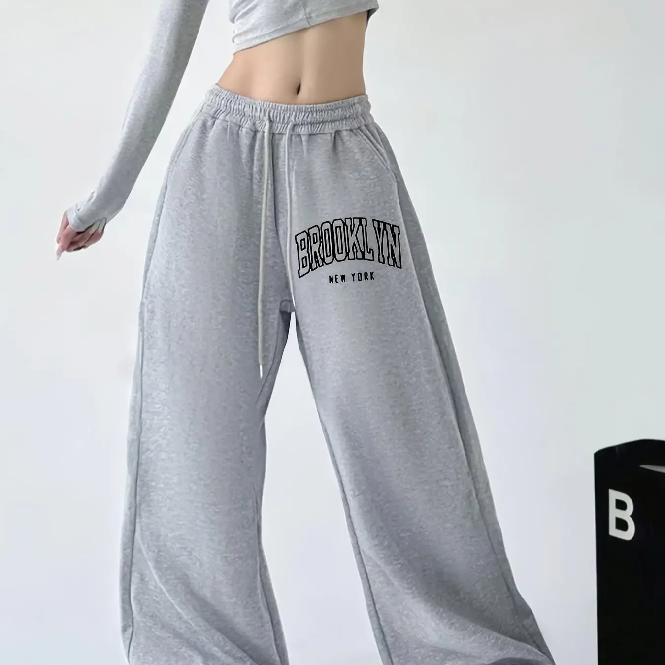 Best-selling women's casual letter-printed drawstring stretch waist straight-leg pants, with pockets,trendy hip-hop street style