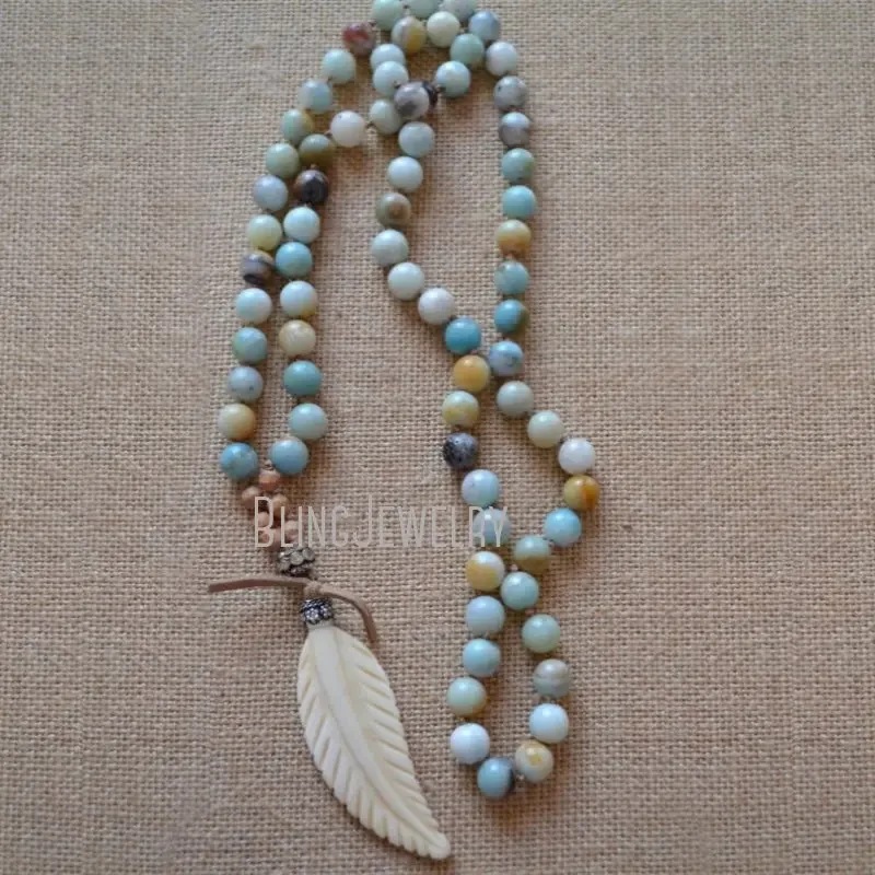 NM23760 Boho Chic Knot  Beads Necklace for Women with Cream Bone Feather Pendant Designer Jewelry