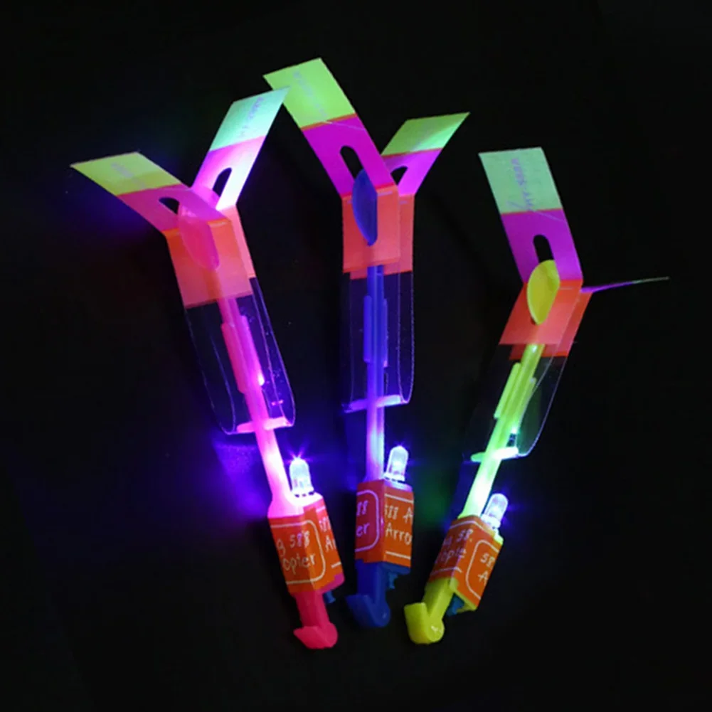 10-100pcs Outdoor Shining Rocket Flash Night Kids Luminous Slingshot Toys LED Shine Slingshot Elastic Helicopter Rotating Toy