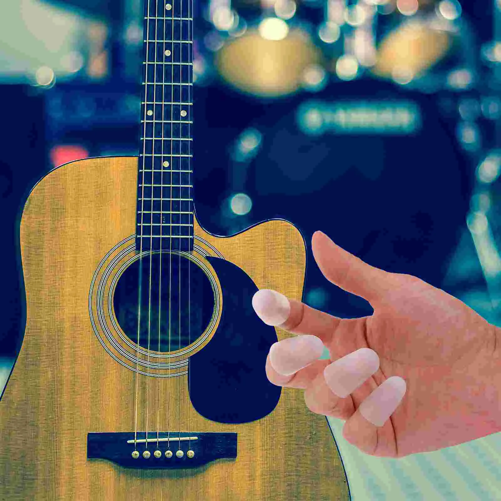 

4 Pcs Guitar Pain Relief Finger Cots Fingertip Protectors Cover Playing Protection Practice Caps Guard Silica Gel Covers