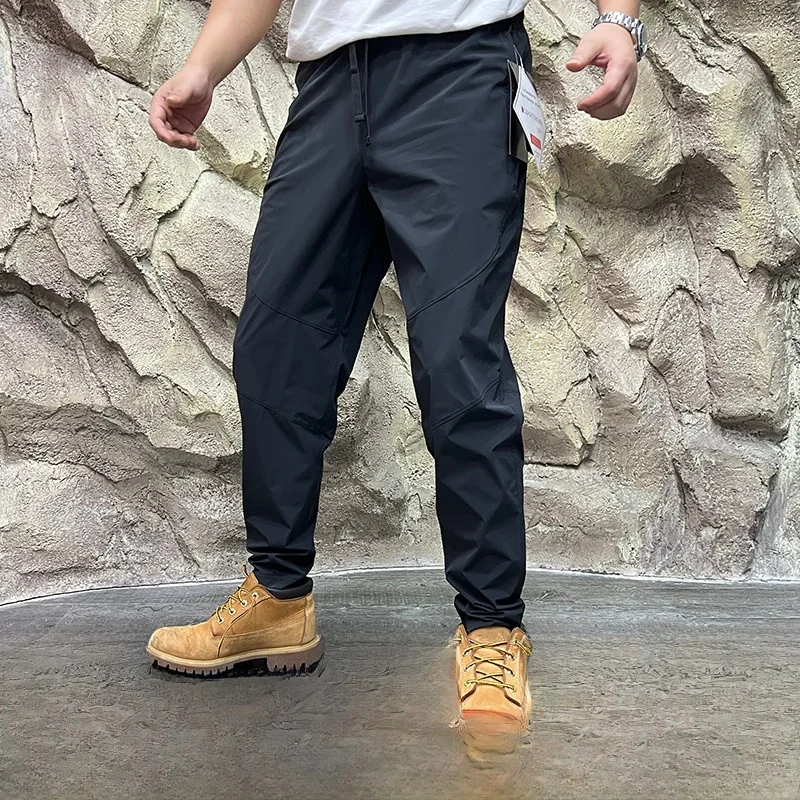 

New 2025 Spring Men's Outdoor Casual Pants Elastic Training Trousers Qui Dry Tailored Fit Straight Leg Breathable Faionable