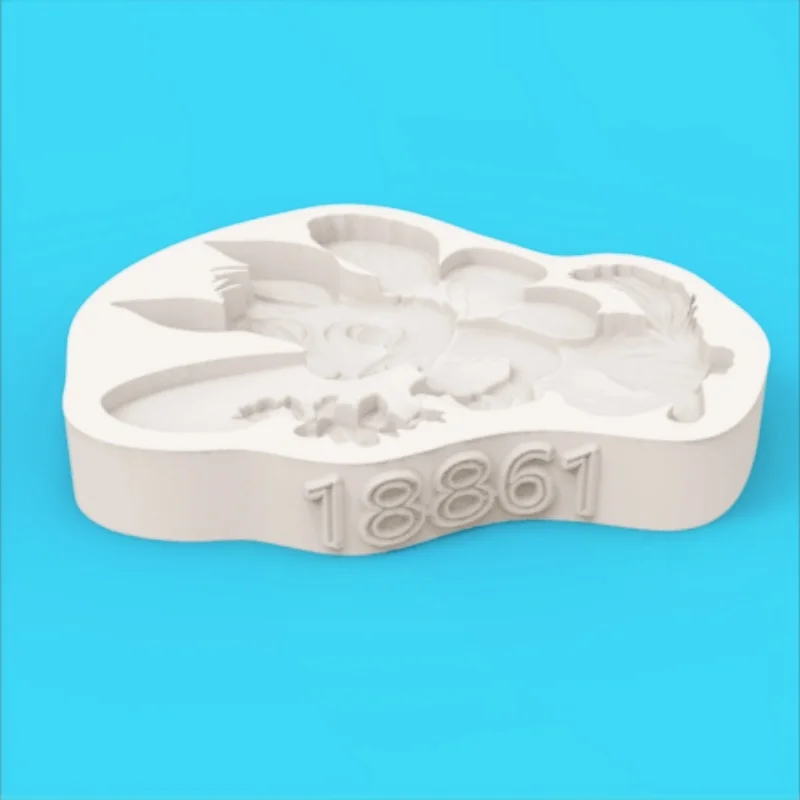 A Silicone Mold with Winged Squirrel, Flower, and Butterfly Elf Designs for Making Fondant Chocolate
