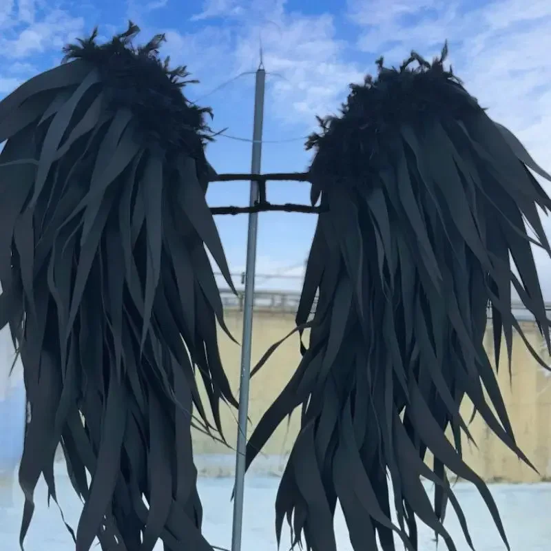 التصوير الفوتوغرافي لدعامة الجناح الأسود لتصوير دعائم الرماية لأداء حفلات الهالوين