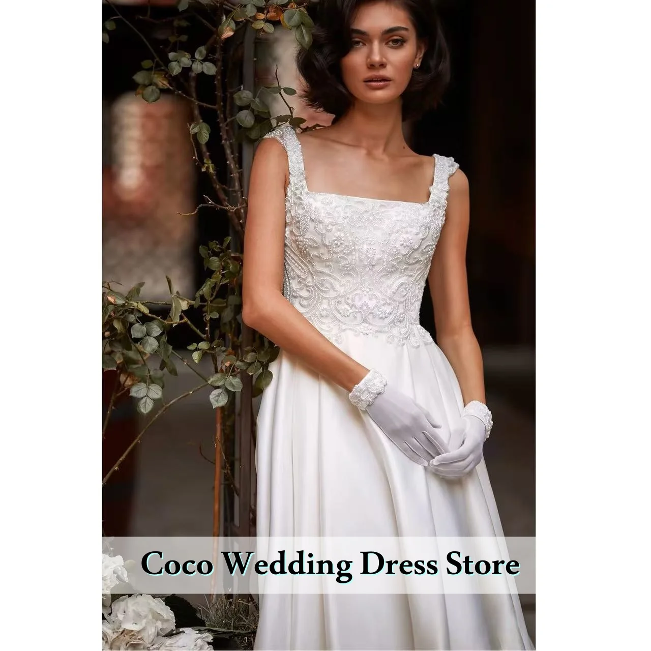 فساتين زفاف رائعة بياقة مربعة مخصصة من الساتان فساتين زفاف مطرزة بدون أكمام بدون ظهر فيستدوس دي نوفيا