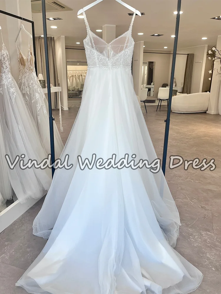 ชุดแต่งงานสายเดี่ยวประดับมุกหรูหราทรงเอไลน์ผ้าทูลล์ รุ่น Vindal Luxury Pearl Beading ปี 2026 สไตล์โบฮีเมียน สำหรับงานแต่งงานแบบเรียบง่าย สามารถสั่งตัดได้