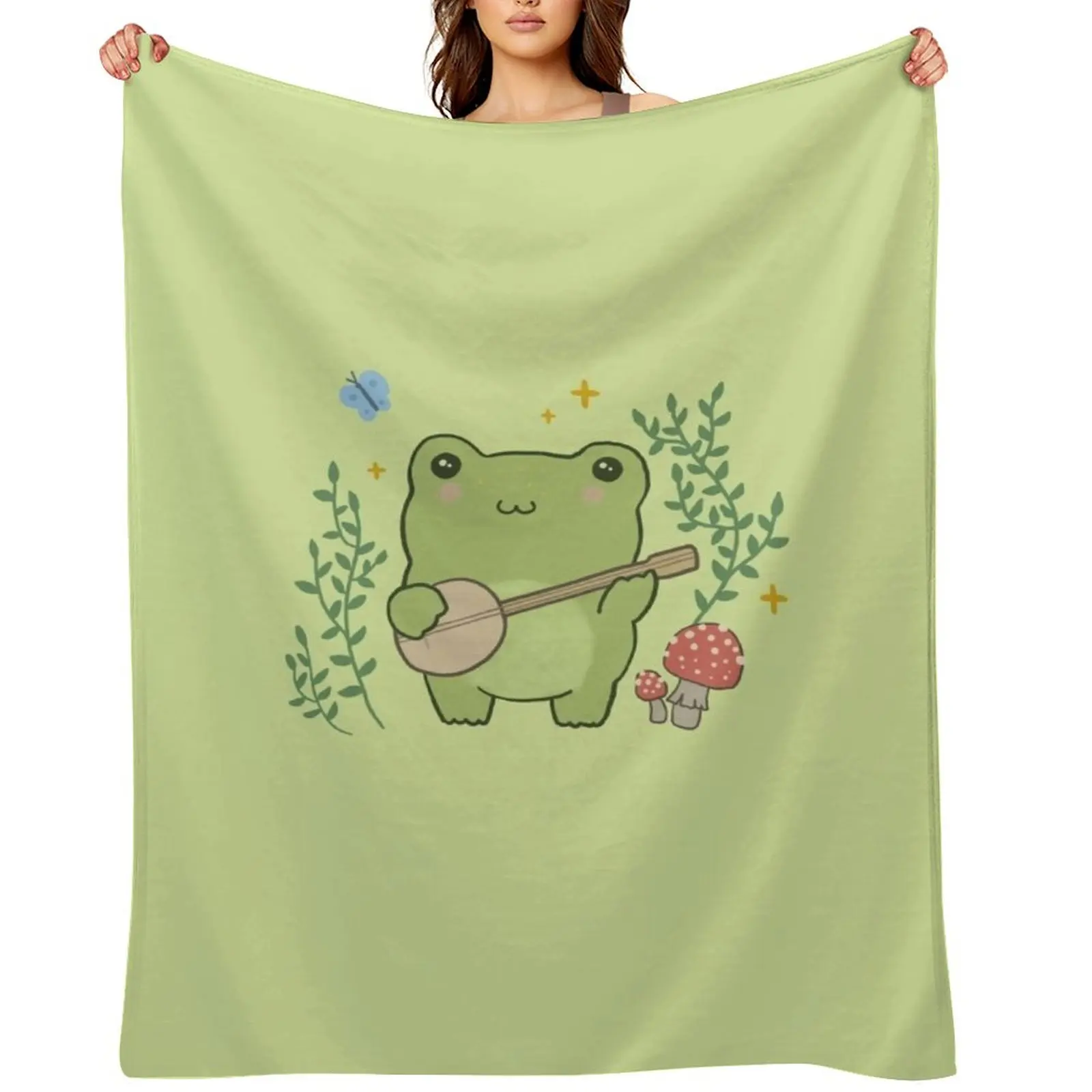 

Cute Kawaii Frog Playing Banjo - Toad Plant Fungi Blue Butterfly - Cottagecore Aesthetic Mushroom - Chubby Phrog Throw Blanket