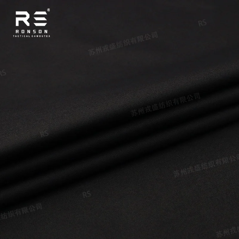 قماش كوردورا مطلي بالبولي أميد 100% من النايلون 500D H01 # معالجة بالأشعة تحت الحمراء السوداء، استخدام متين لمعدات التروس التكتيكية WR+NIR