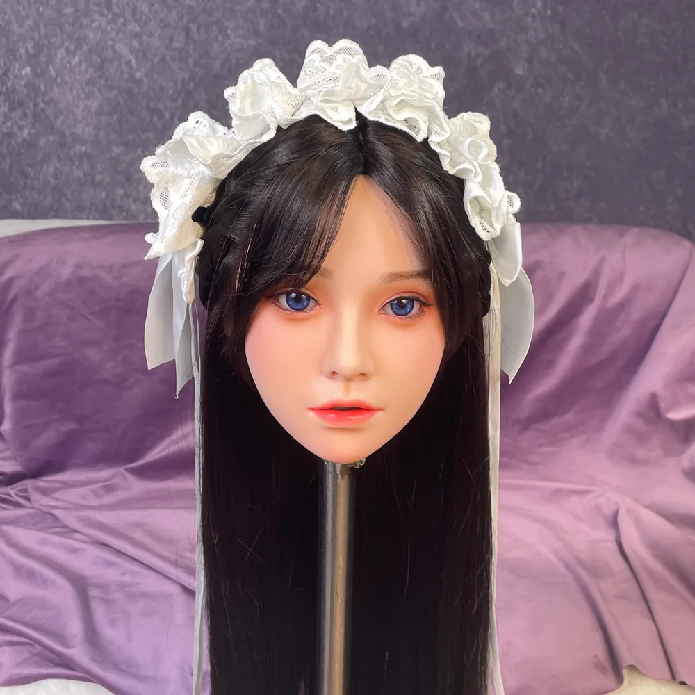 

1:1 replica of a female head model, new design, made of silicone material, with realistic skin texture,stof(without accessories)