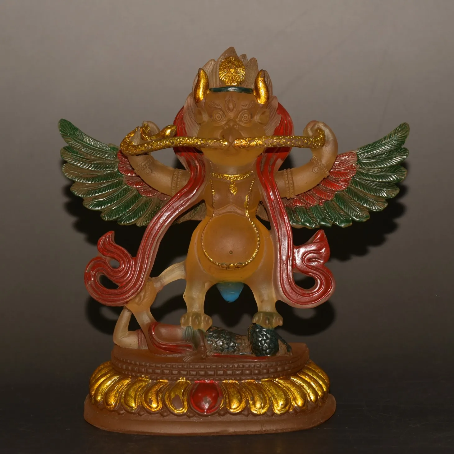 

Early collection of a finely crafted cloisonné glass and enamel large phoenix Buddha figurine