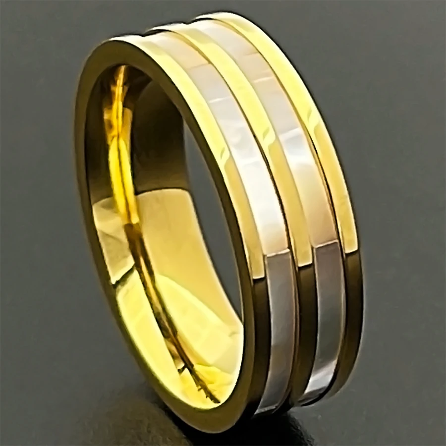 

A stainless steel ring with two natural shell inlays , extremely beautiful ,the top choice for a gift