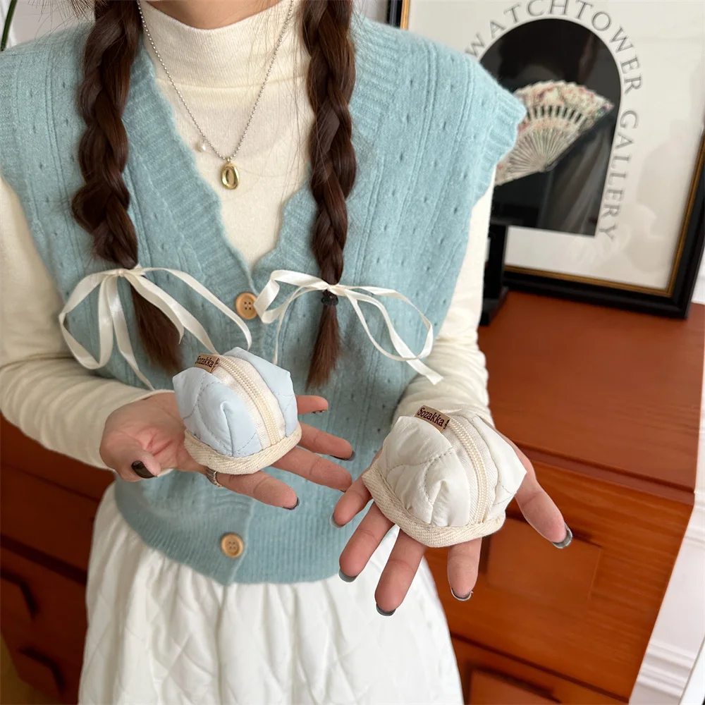 เคสป้องกันหูฟังขนาดเล็ก, กระเป๋าเก็บหูฟังของ Apple, กระเป๋าหูฟังบลูทูธไร้สายของ Apple แบบพกพา, กระเป๋าลิปสติกแบบเหรียญ