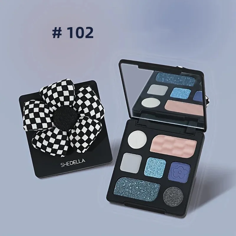 マット、パール、シマー、グリッター仕上げ、ニュートラルなアーストーンを備えた7色のフラワーアイシャドウパレット1箱。