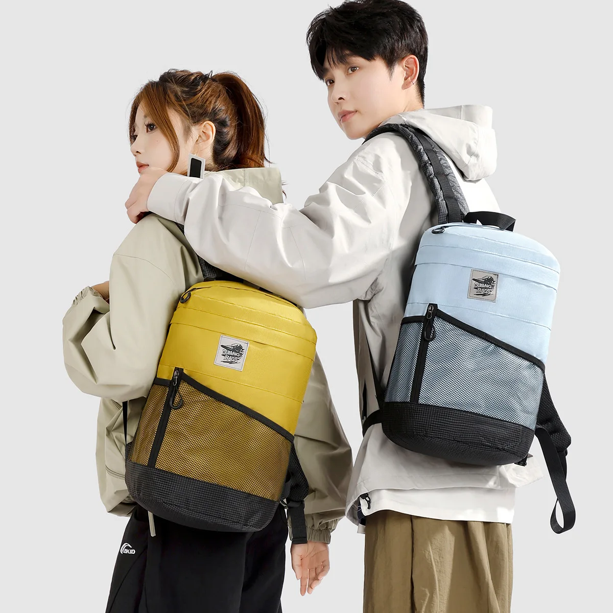 Nylon fabric ultra-light spliced color-blocking men's backpack, cylindrical waterproof hiking backpack