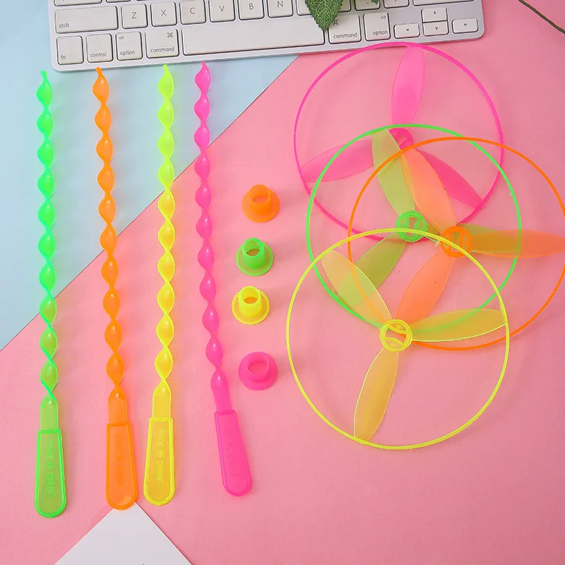 20PcsLot Pull String UFO Flying Saucer Toys Plastic Flying Disc Helicopter Outdoor Lawn Sports Game For Kids Boys Girls Wholesal