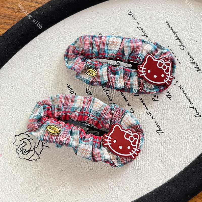 Hello Kitty Sanrio lindo dibujo animado Kt gato patrón de rejilla horquilla Kawaii tocado periferia accesorios para el cabello flequillo Clip LATERAL