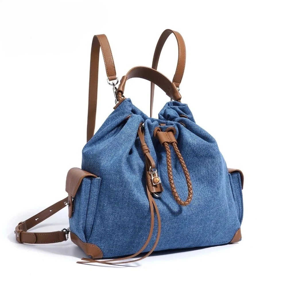 

Retro Denim Patchwork Cowhide Leather Drawstring Backpack Large Capacity Shoulder Bag Boho Chic Bookbag Rucksack
