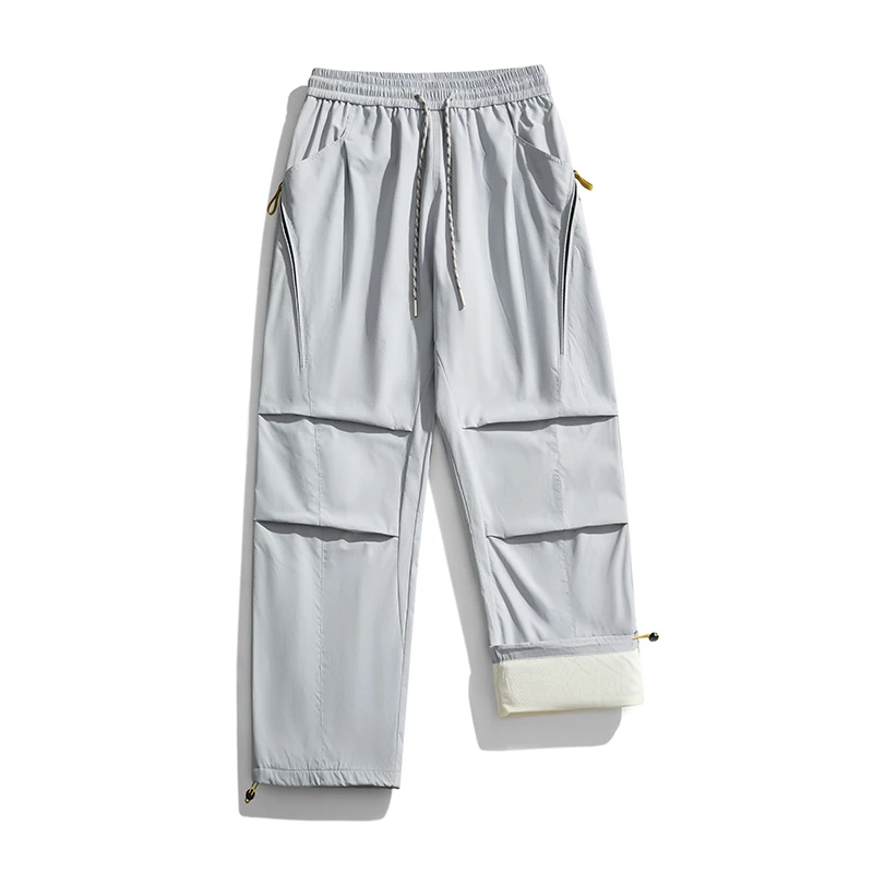 Pantalones convertibles urbanos para exteriores, pantalones de trabajo aislados impermeables con forro polar extraíble, diseño de bloques de color para todo tipo de clima