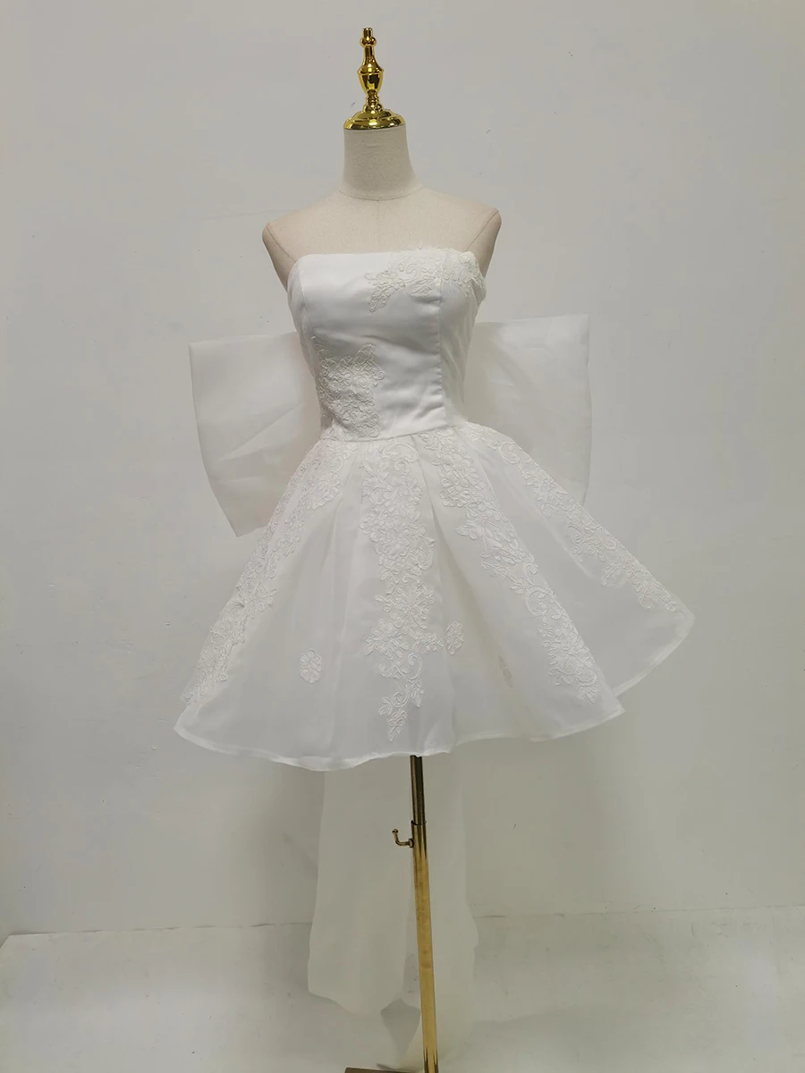 TWOTWINSTYLE solide épissé maille nœud papillon robes douces pour les femmes sans bretelles sans manches taille haute élégant Mini robe femme nouveau