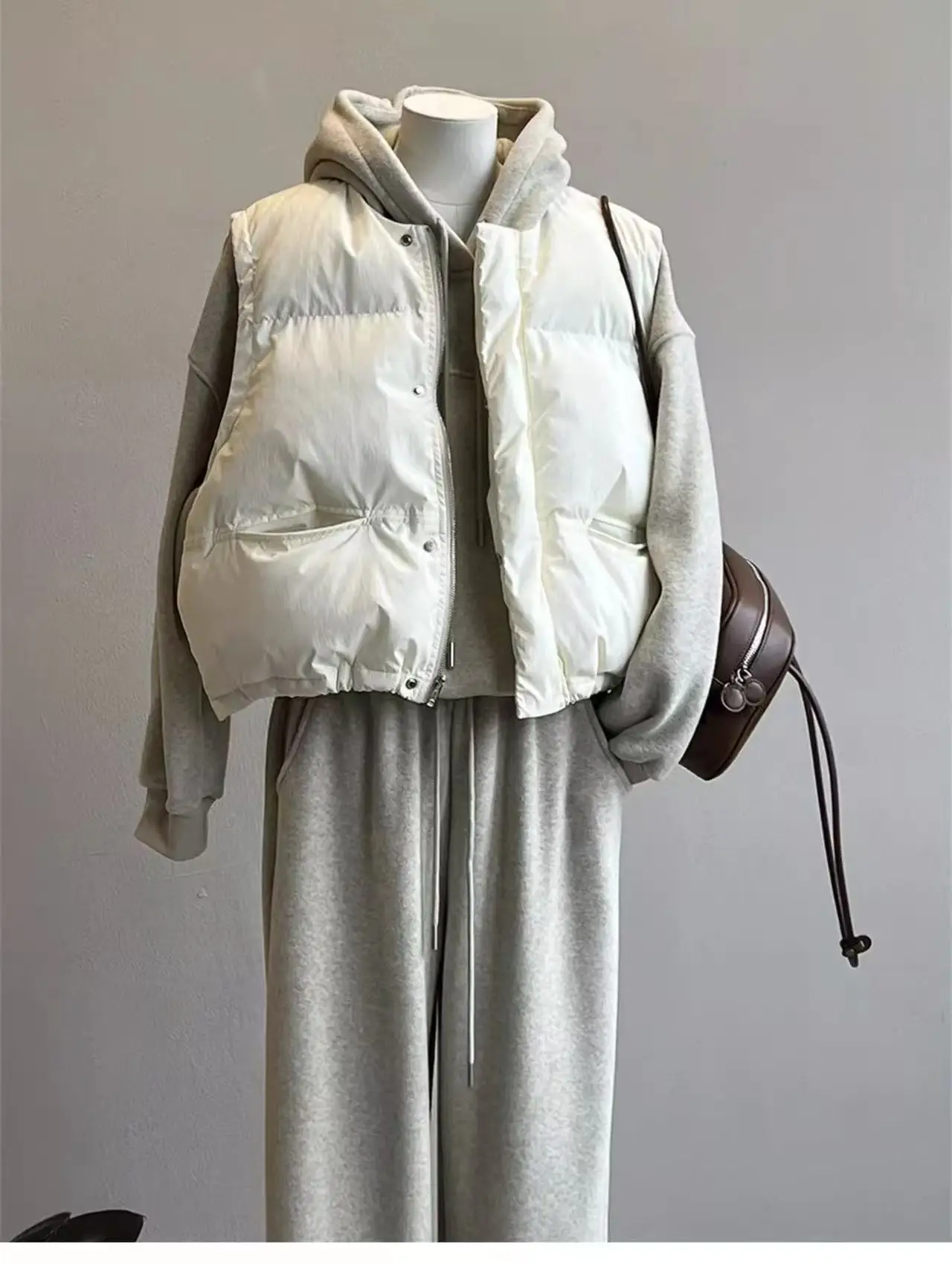 سترة نسائية كورية شتوية دافئة مبطنة بالقطن بدون أكمام بجيوب كبيرة سترات سميكة للنساء