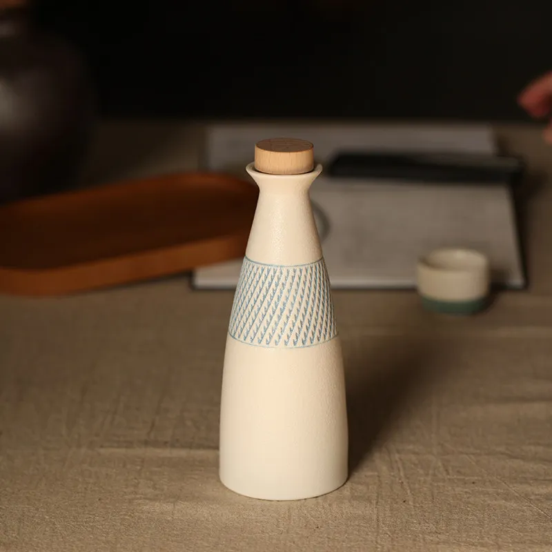 Ceramic Sake Bottle White Textured Liquor Decanter with Wooden Stopper Blue Pattern Band For Home Bar Sake Serving Table Decor view 3