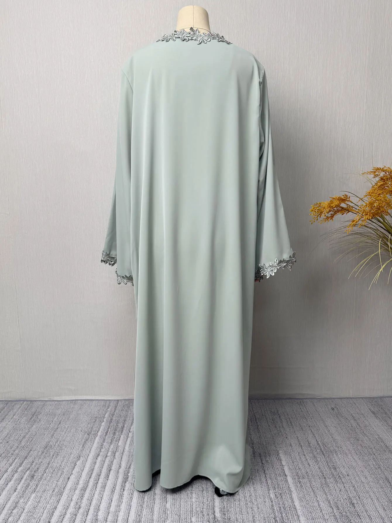 Dubai Elegant  Green Abaya for Muslim Women - Intricately Crafted with Multicolored Embroidery Piece in Islamic Modest Fashion