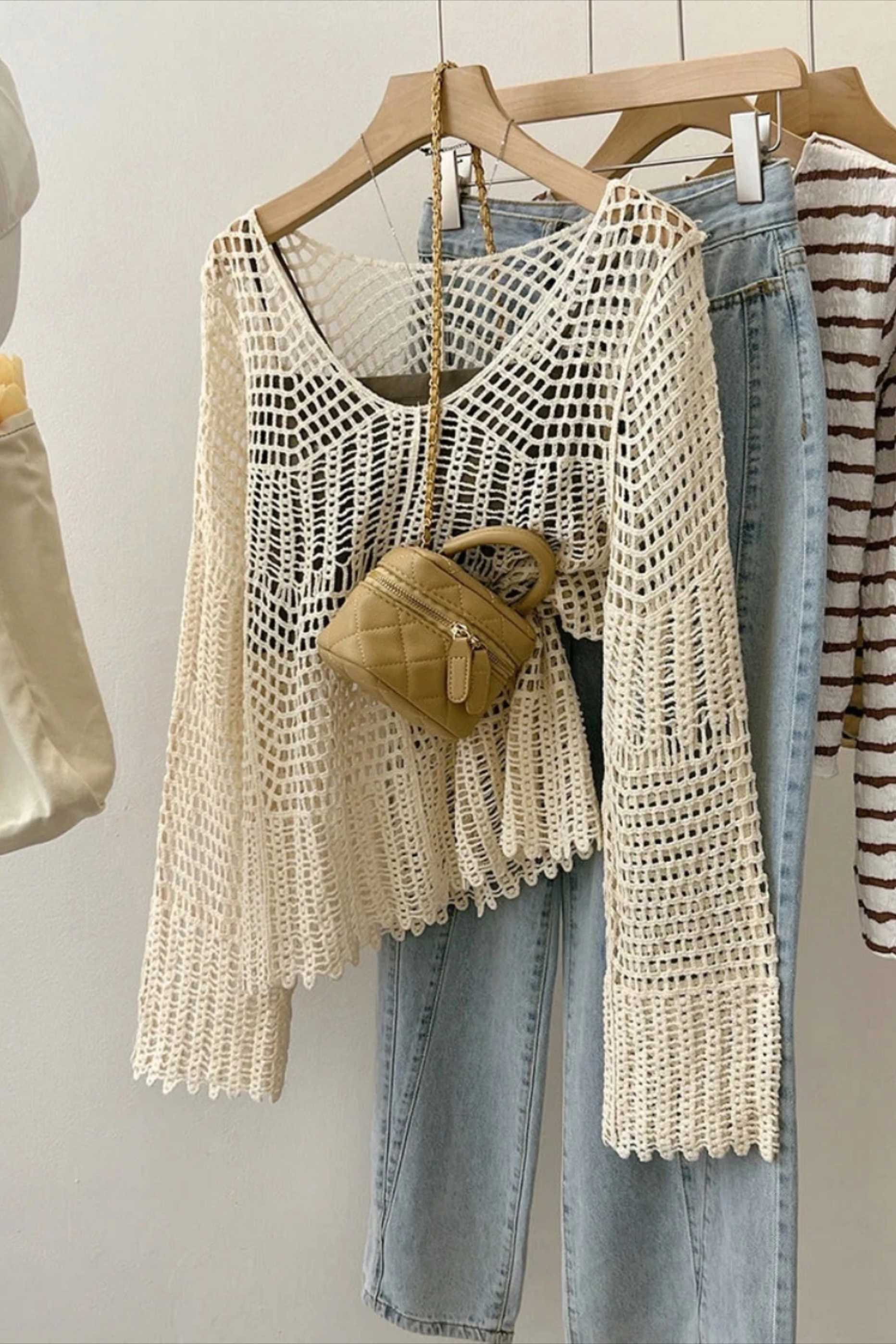 

2025 Spring And Autumn Bohemian Vacation Beach Crochet Cardigan Sweet Hollow Long Sleeve Round Neck Knitted Pullover Top