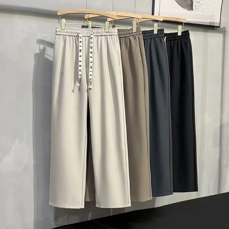 

Мужские повседневные брюки на весну-осень: свободные, широкие, в пол, с завязками, струящиеся, тонкие, дышащие, универсальные, молодежные, прямого кроя