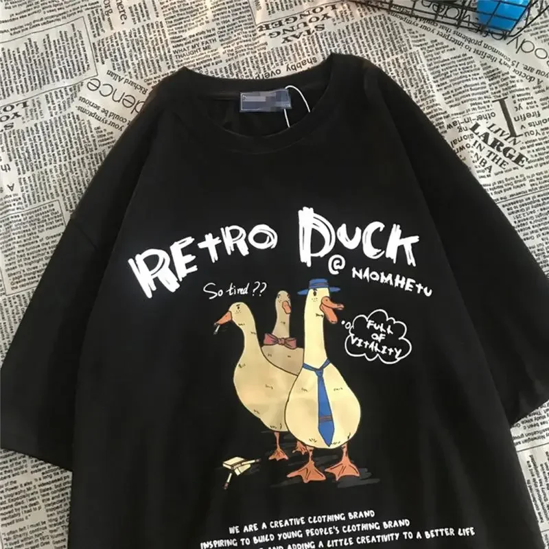 Maglietta a maniche corte Casual femminile top 2023 T-Shirt Harajuku maglietta nera stampata gatto divertente Kanji giapponese Streetwear neutro