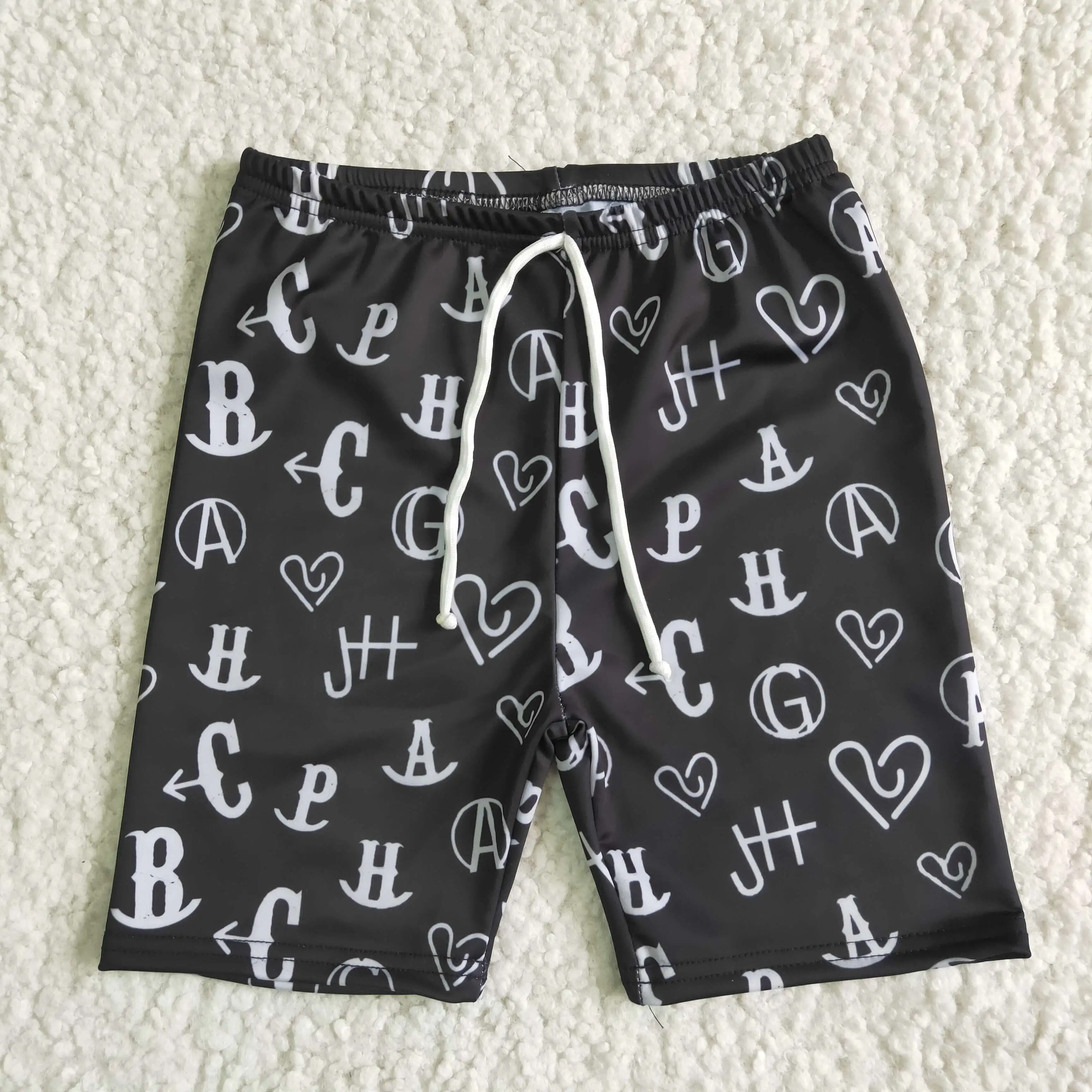 

RTS NO MOQ New Style Summer Boutique Boys Swim Trunk Design Black Lettering Drawstring Swim Shorts Kids Beach Shorts