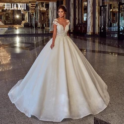 Julia Kui Elegant Shiny Tulle Scoop Ball Gown Wedding Dresses Short Sleeves Beading Pearls Appliques Lace Bridal Gowns