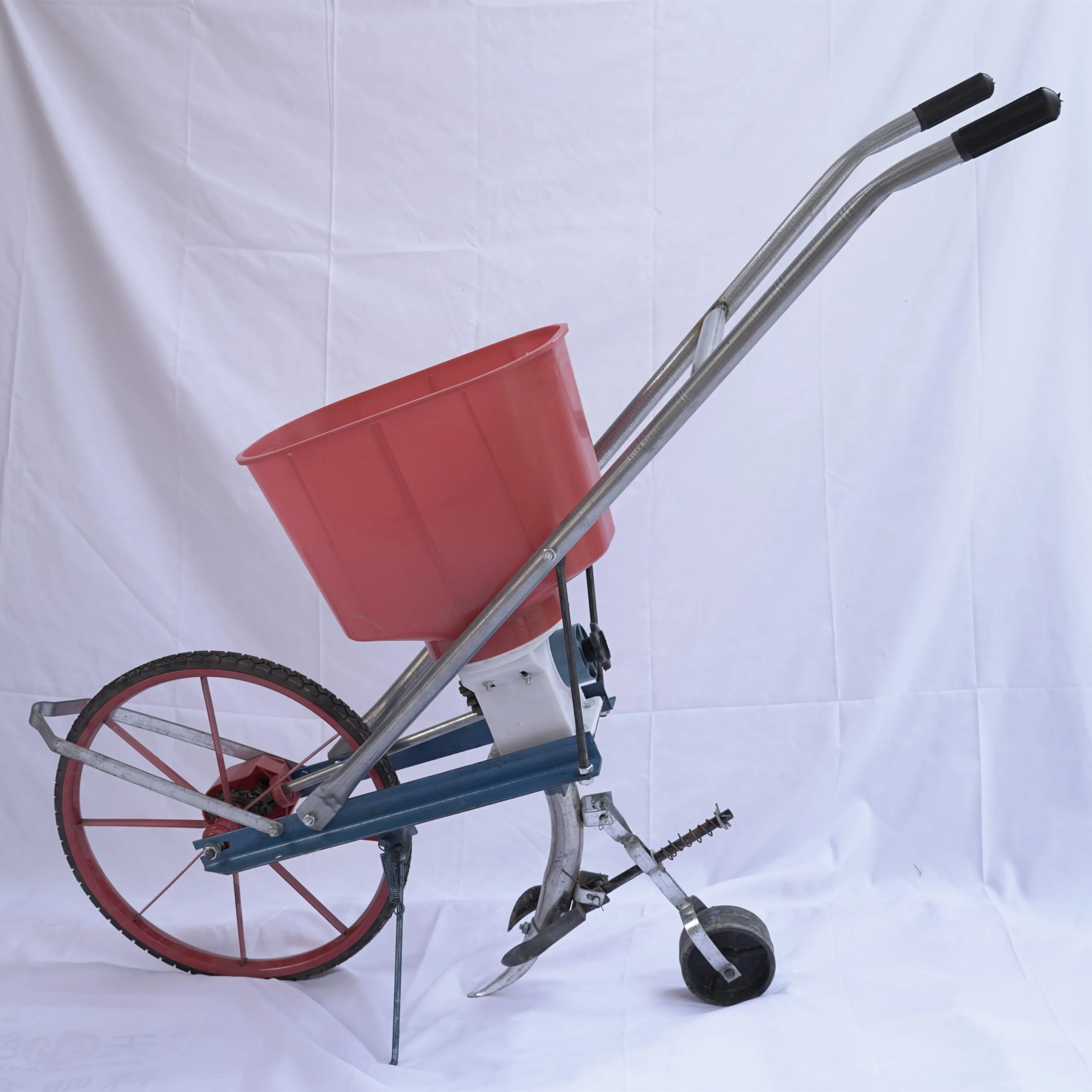 2025 مثقاب تطبيق الأسمدة من النوع الذي يعمل بالدفع اليدوي للزراعة الفورية والبذر الدقيق. صغيرة الحجم.