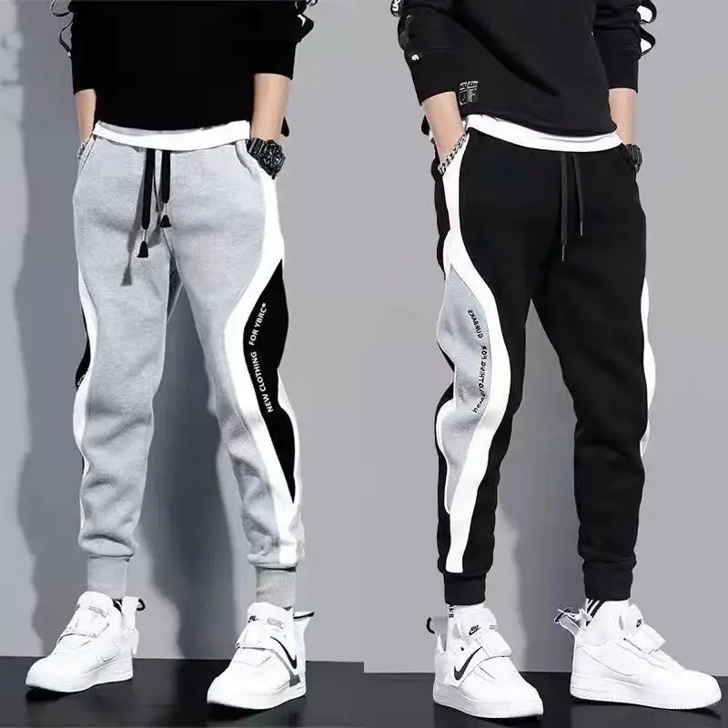 Pantaloni di protezione sottili primaverili e autunnali per pantaloni Casual alla moda da uomo pantaloni sportivi attillati larghi di grandi dimensioni pantaloni versatili per uomo