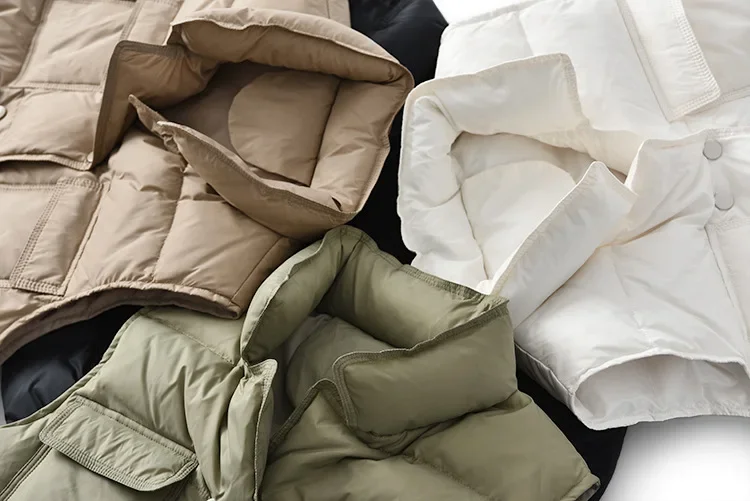 เสื้อกั๊กดาวน์เวอร์ชั่นเกาหลีสำหรับผู้หญิง เสื้อคลุมตัวนอก คอตั้งรัดเอว แจ็คเก็ตขนเป็ดขาว 2025