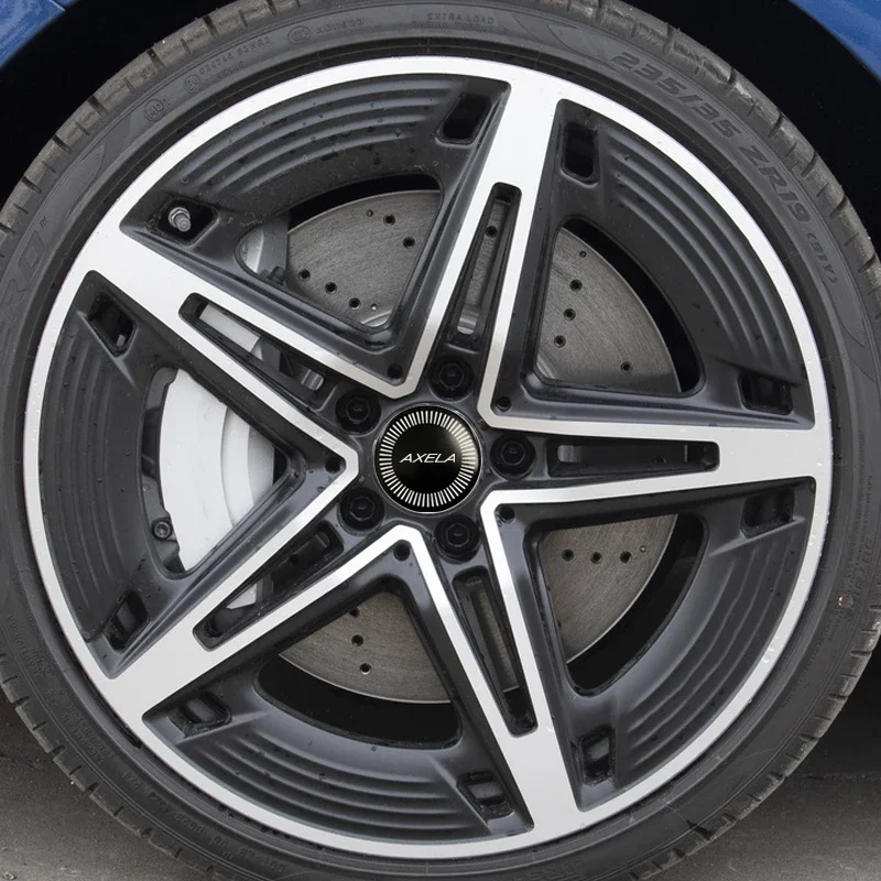 4 قطعة 56/60/65 مللي متر سبيكة سيارة محور عجلات مركز ملصقات لمازدا أكسيلا شعار ATENZA CX-3 CX-4 CX-5 CX-9 CX-30 MPS MX-5 RX-7 Skyactiv