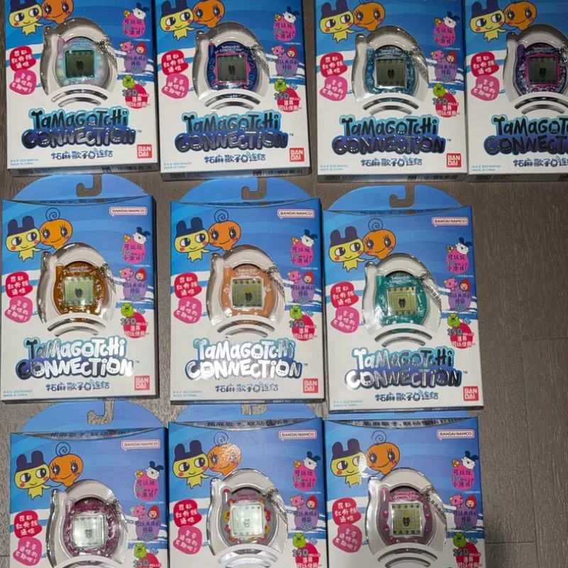 ของแท้จาก Bandai แทมาก็อตจิ เกมสัตว์เลี้ยง ของเล่นเครื่องเล่นเกมสัตว์เลี้ยง ของสะสม ฟิกเกอร์ตกแต่ง ของขวัญวันเกิด