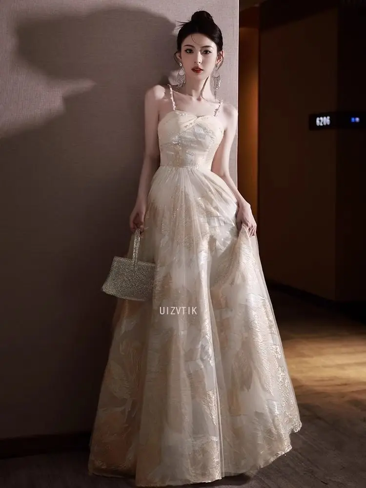 ชุดราตรีแบบไม่มีสายคาดไหล่ แชมเปญ ประดับลายปักดอกไม้สุดหรู ชุดงานเลี้ยงค็อกเทล ผ้าทูลล์คลาสสิก ทรงเอไลน์ยาว ชุดออกงานทางการ