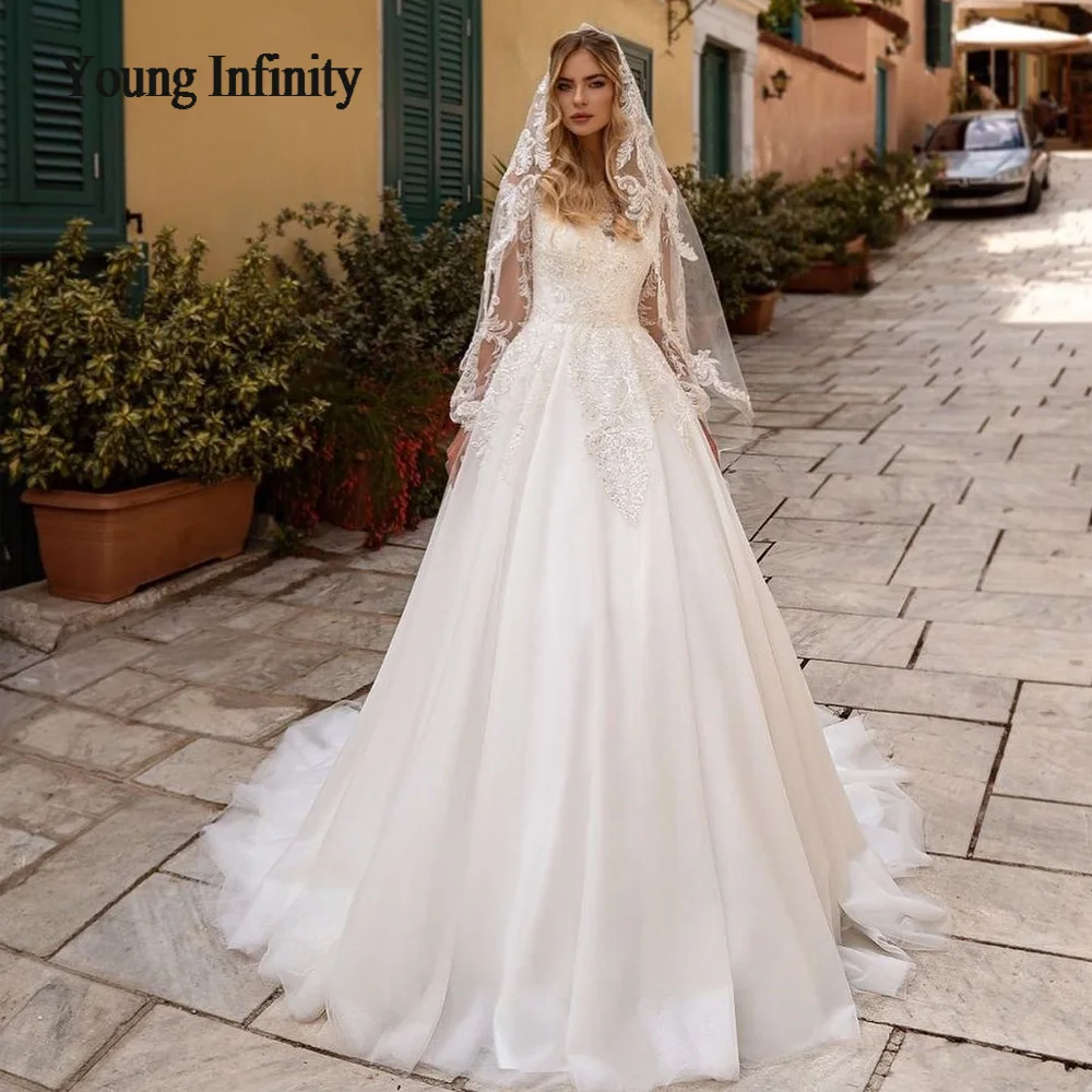 

Elegant A Line Long Sleeves Tulle Wedding Dresses 2024 O Neck Beading Crystals Lace Appliques Boho Bridal Gown Vestido De Noiva